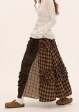 brown plaid skirt, layered midi skirt, patchwork check skirt, ruffle plaid skirt, autumn winter outfit women, mocha mid length skirt, fw25 collection, street boutique fashion, korean plaid fashion, tokyo style skirt