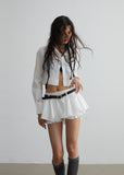 White versatile anti-exposure ruffled mini skirt