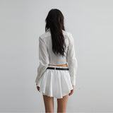 White versatile anti-exposure ruffled mini skirt