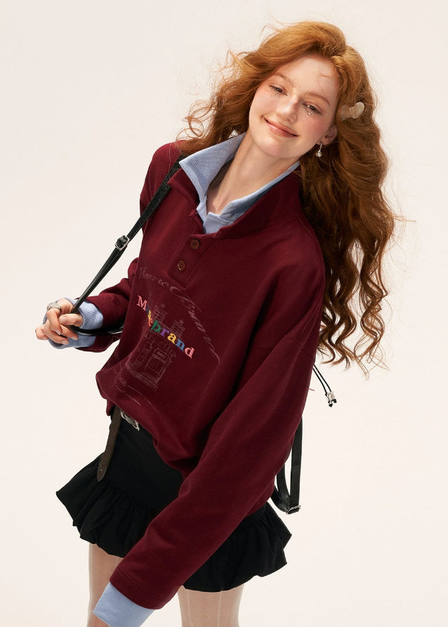 fake two piece polo sweatshirt women, button lapel layered top, american casual loose fit sweatshirt, 2025 street fashion women, korean sporty street top, preppy layered polo sweater, fake layer collar pullover, casual lapel sweatshirt outfit, nowa tokyo american street style
